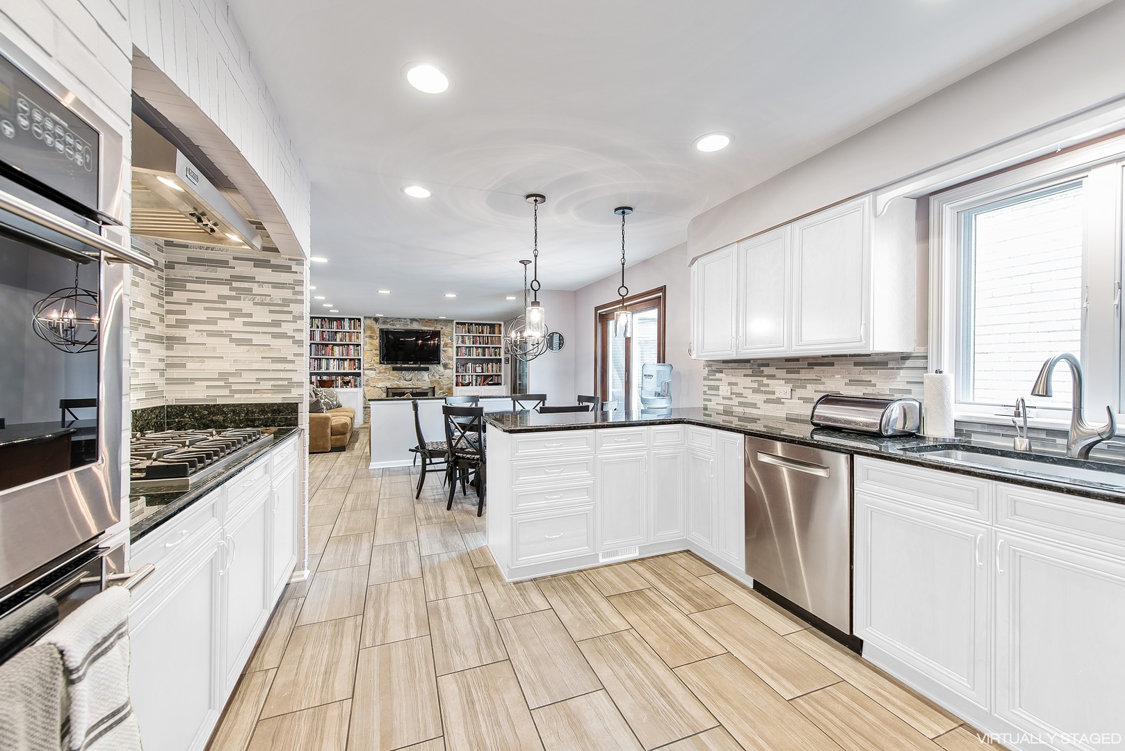 235 Maple Hill Road Glencoe, IL 60022 - Photo 8 of 35 a kitchen with stainless steel appliances granite countertop sink stove and wooden cabinets
