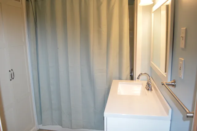 a bathroom with a sink and a tub