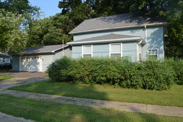 a house that has a lot of plants in it