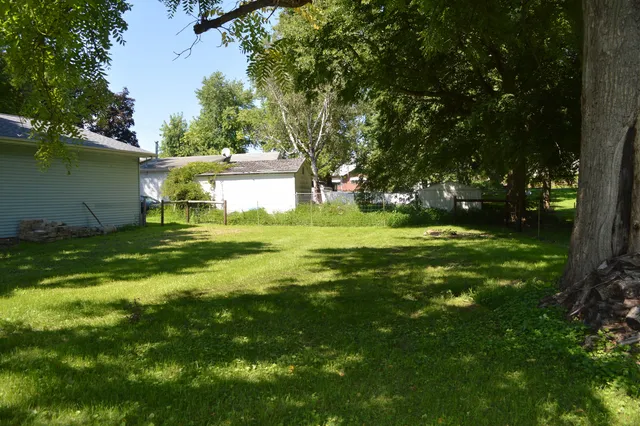 a view of a house with a big yard