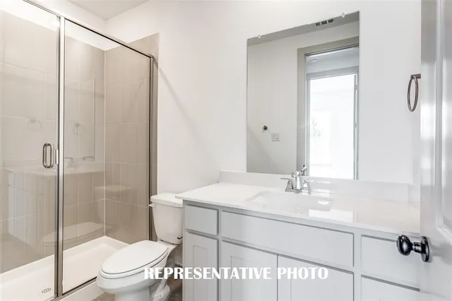 a bathroom with a sink a bathtub and a window