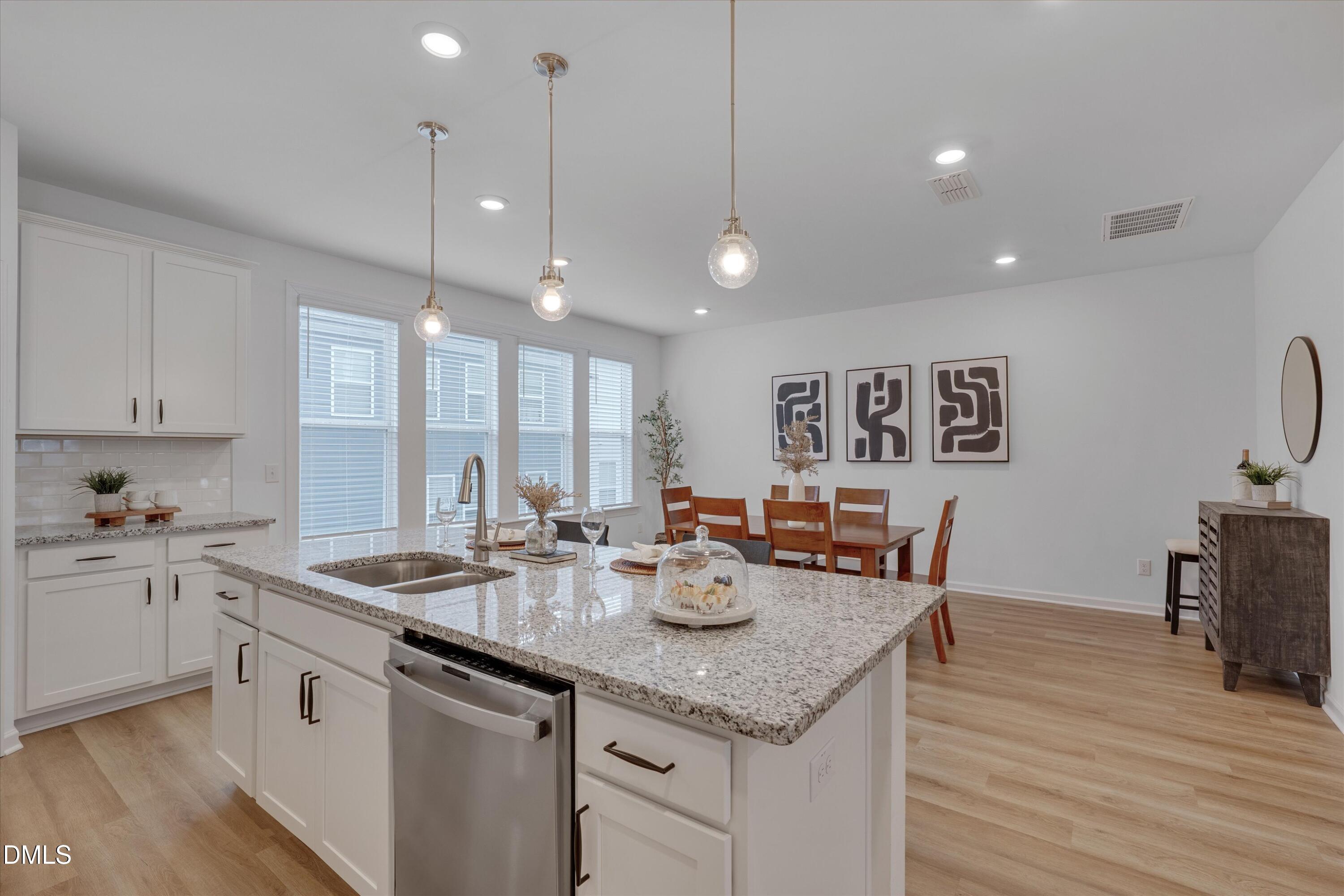 7009 Gentle Pine Place Raleigh, NC 27613 - Photo 11 of 23 Open Kitchen & Dining