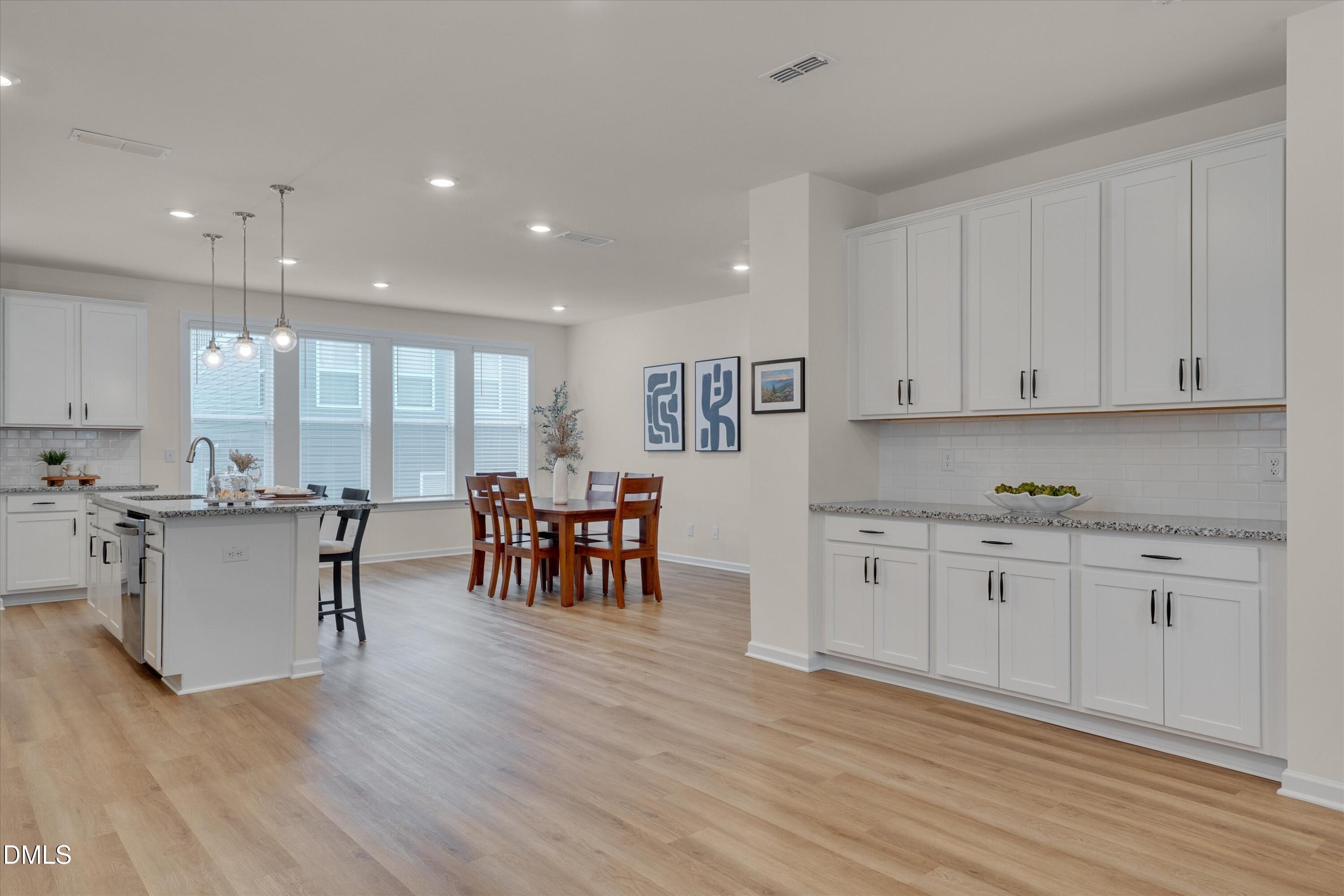 7009 Gentle Pine Place Raleigh, NC 27613 - Photo 7 of 23 Open Kitchen & Dining