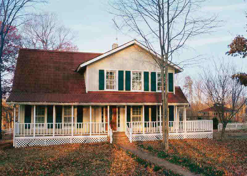 2267 Poindexter Road Louisa, VA 23093 - Photo 1 of 1 a front view of a house with a garden
