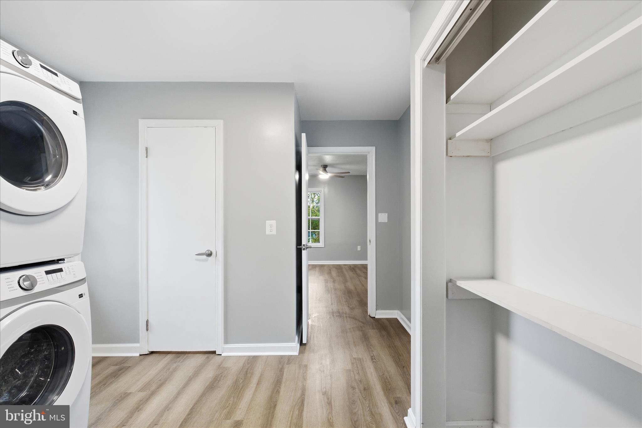 130 Cox Road Huntingtown, MD 20639 - Photo 14 of 41 a view of a hallway with washer and dryer