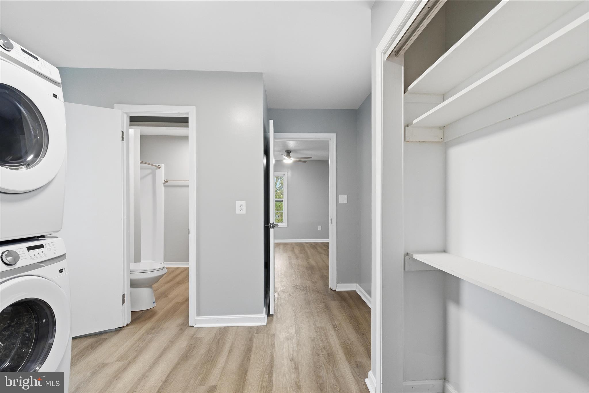 130 Cox Road Huntingtown, MD 20639 - Photo 15 of 41 a view of a hallway with bathroom and wooden floor