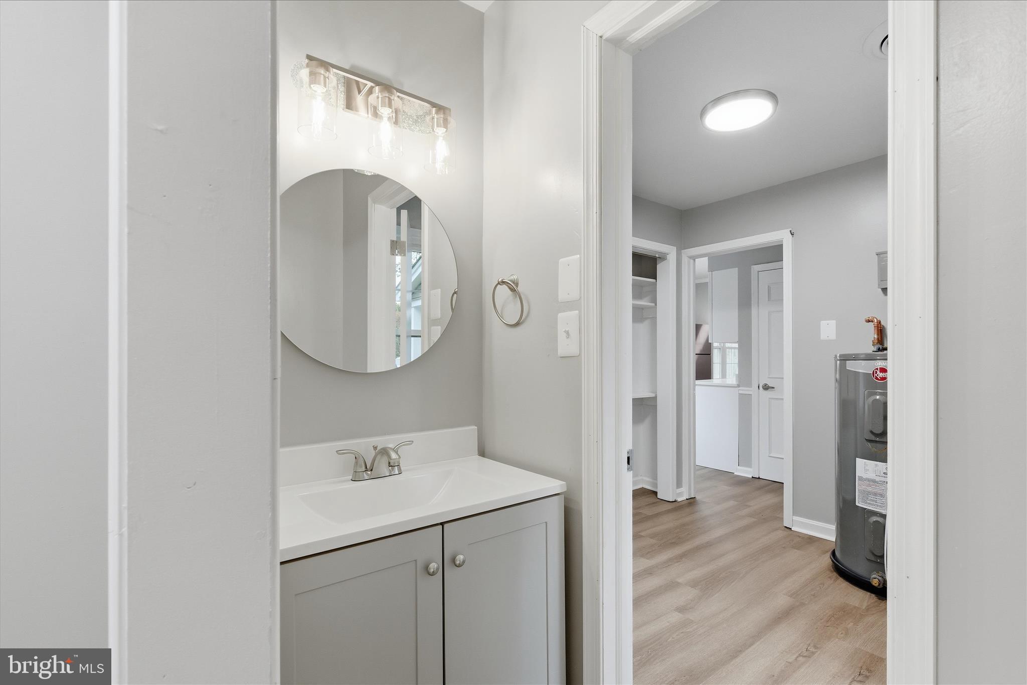 130 Cox Road Huntingtown, MD 20639 - Photo 21 of 41 a view of a bathroom from a hallway