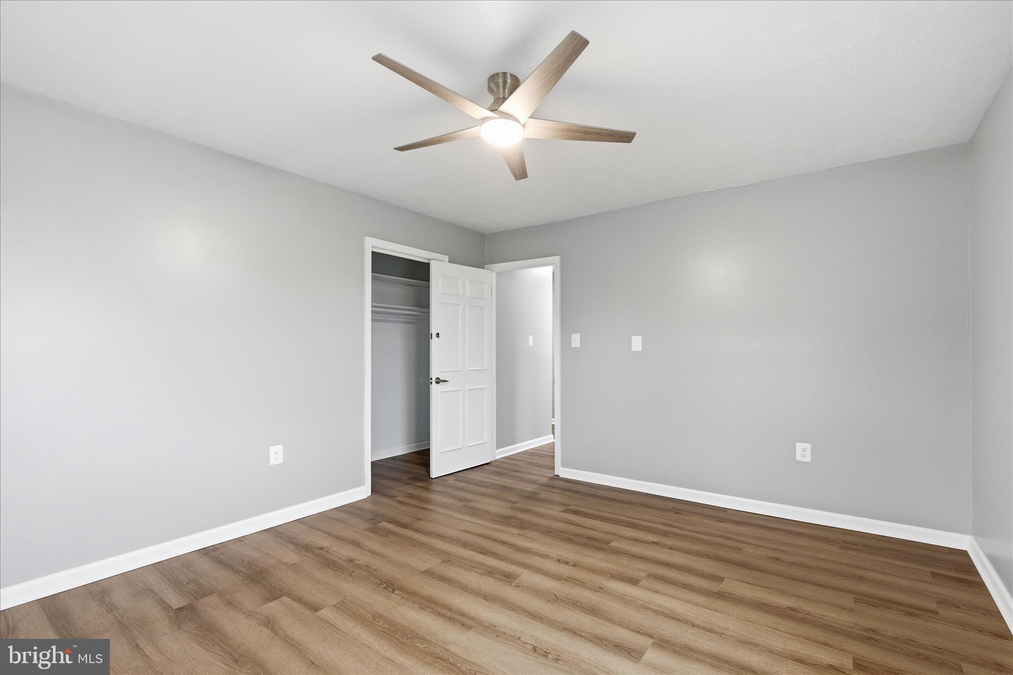 130 Cox Road Huntingtown, MD 20639 - Photo 27 of 41 a view of an empty room with wooden floor