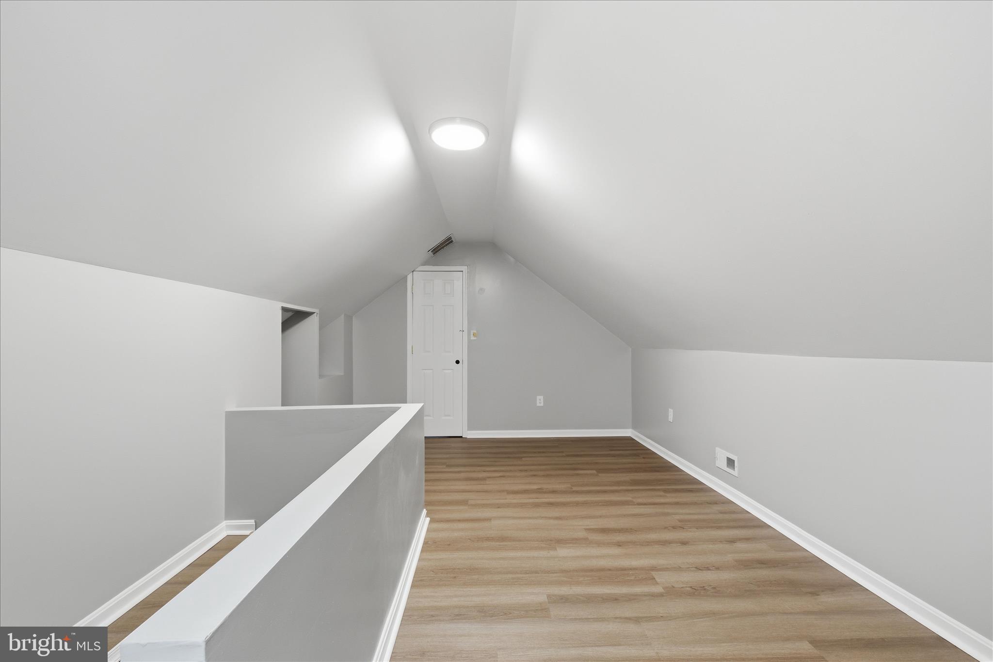 130 Cox Road Huntingtown, MD 20639 - Photo 29 of 41 a view of an empty room with wooden floor