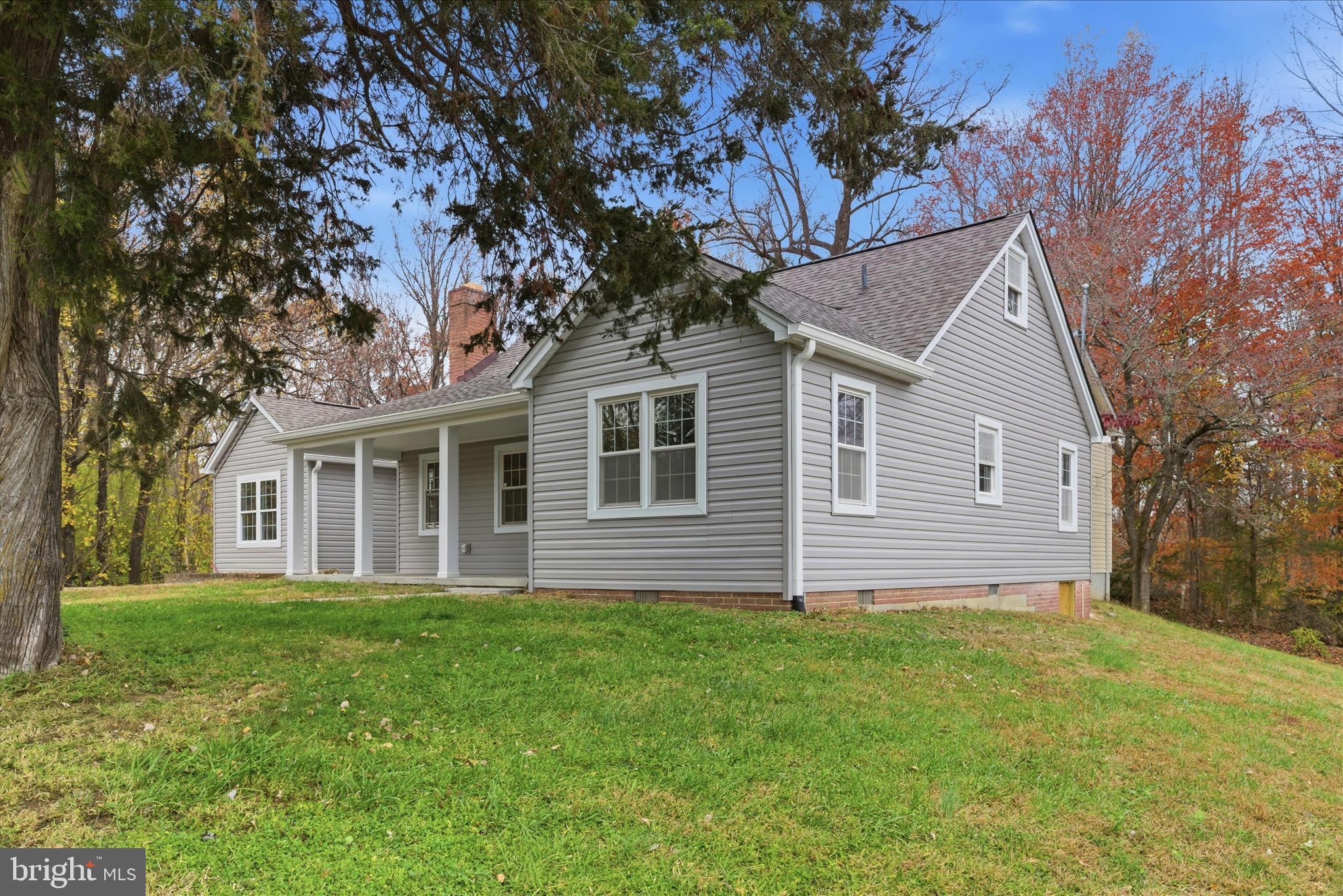 130 Cox Road Huntingtown, MD 20639 - Photo 39 of 41 a front view of house with a garden