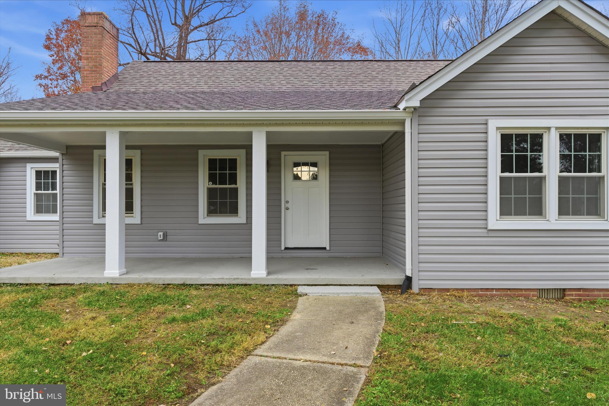 130 Cox Road Huntingtown, MD 20639 - Photo 40 of 41 a front view of a house with garden
