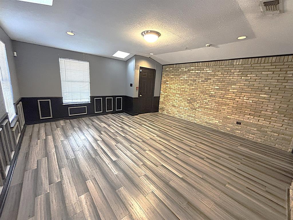 3042 Kiest Ridge Drive Dallas, TX 75233 - Photo 13 of 27 a view of a room with wooden floor