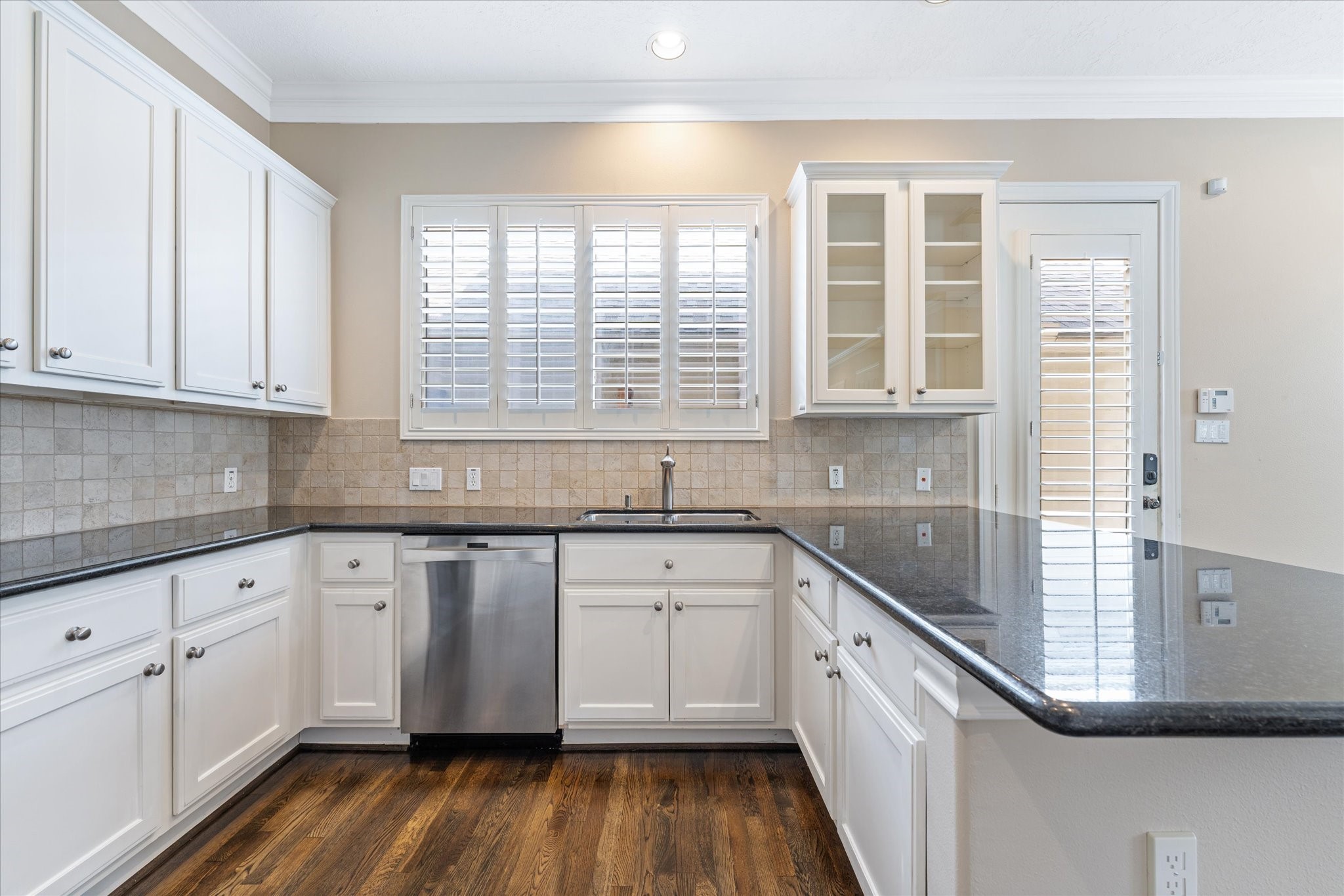 447 North Gate Stone Houston, TX 77007 - Photo 20 of 38 Kitchen: View of Sink and dishwasher and window with natural light coming through!