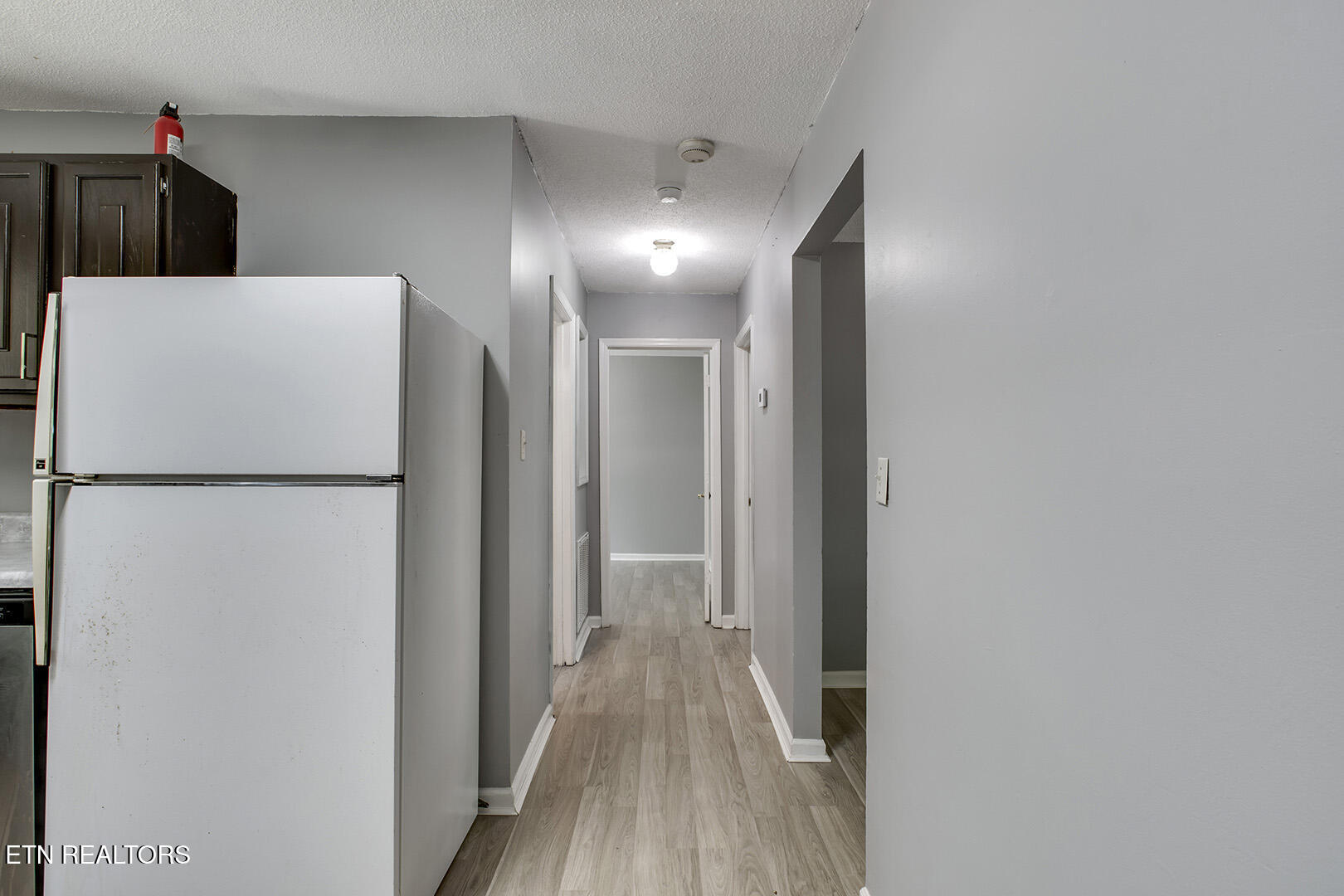 3701 Stephens Road Northeast Cleveland, TN 37312 - Photo 13 of 43 33_StephensRoadNE_3701_R_BedroomHall01