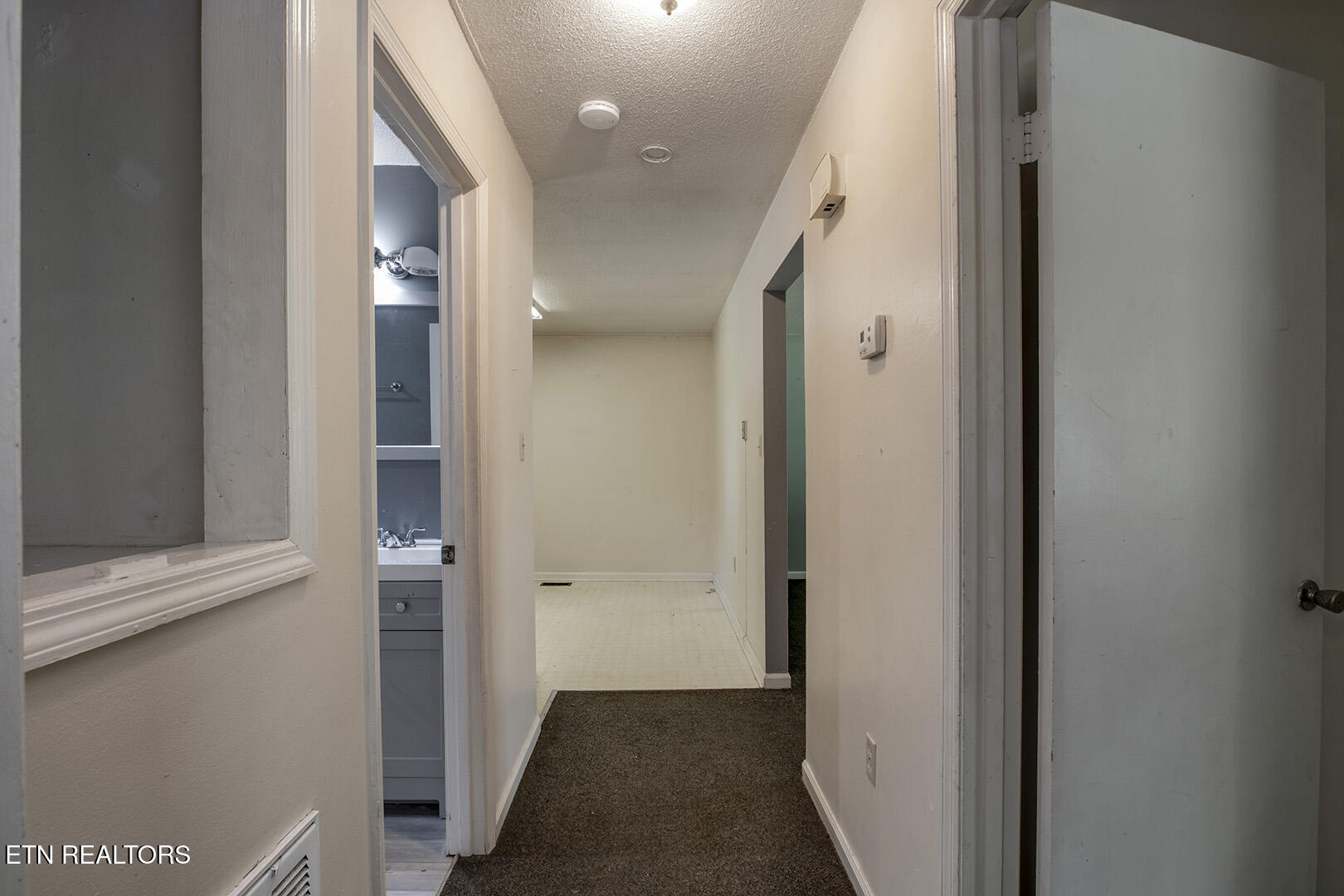 3701 Stephens Road Northeast Cleveland, TN 37312 - Photo 25 of 43 19_StephensRoadNE_3701_L_BedroomHall02