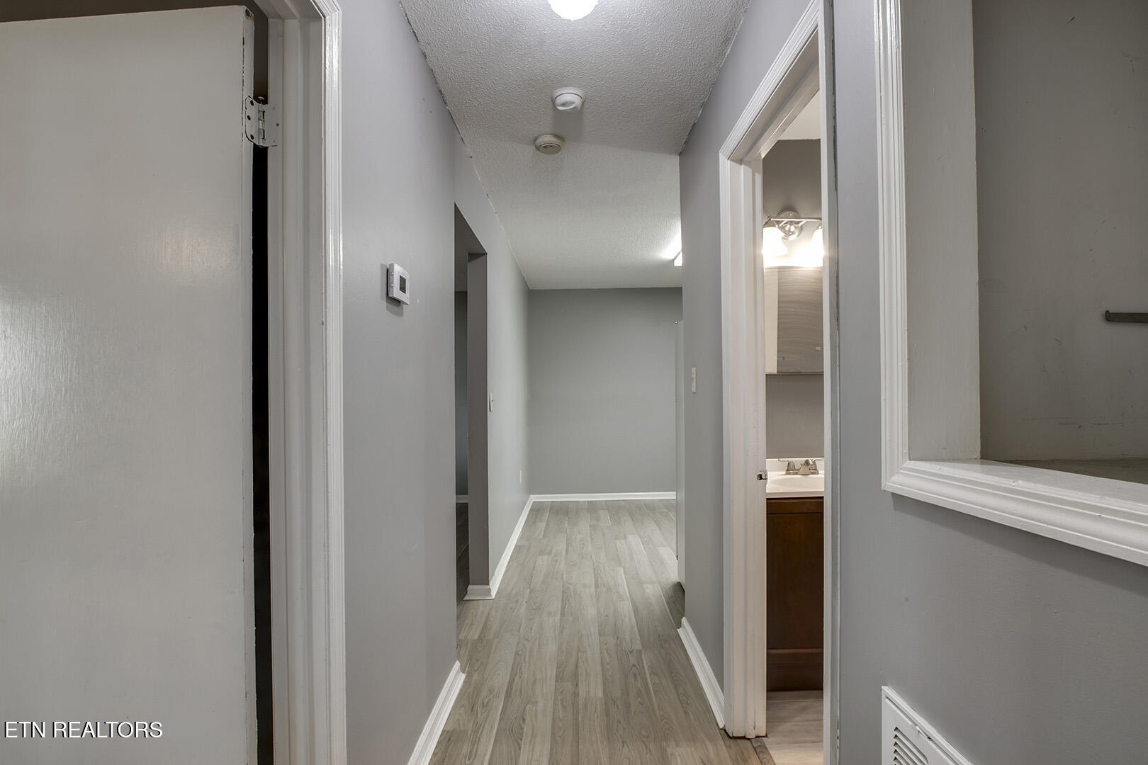 3701 Stephens Road Northeast Cleveland, TN 37312 - Photo 6 of 43 39_StephensRoadNE_3701_R_BedroomHall02