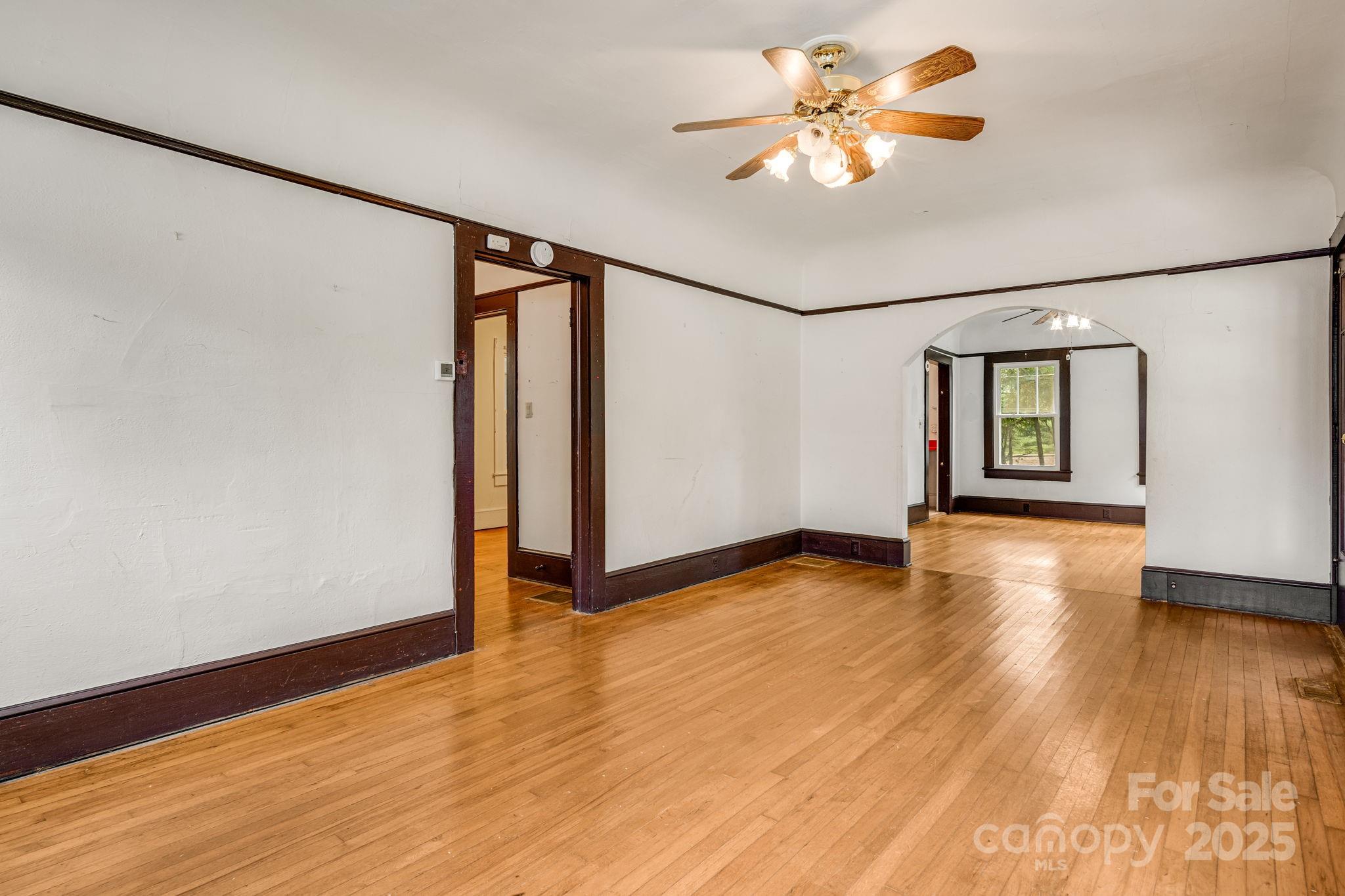206 Rhododendron Drive Brevard, NC 28712 - Photo 11 of 36 a view of empty room with wooden floor