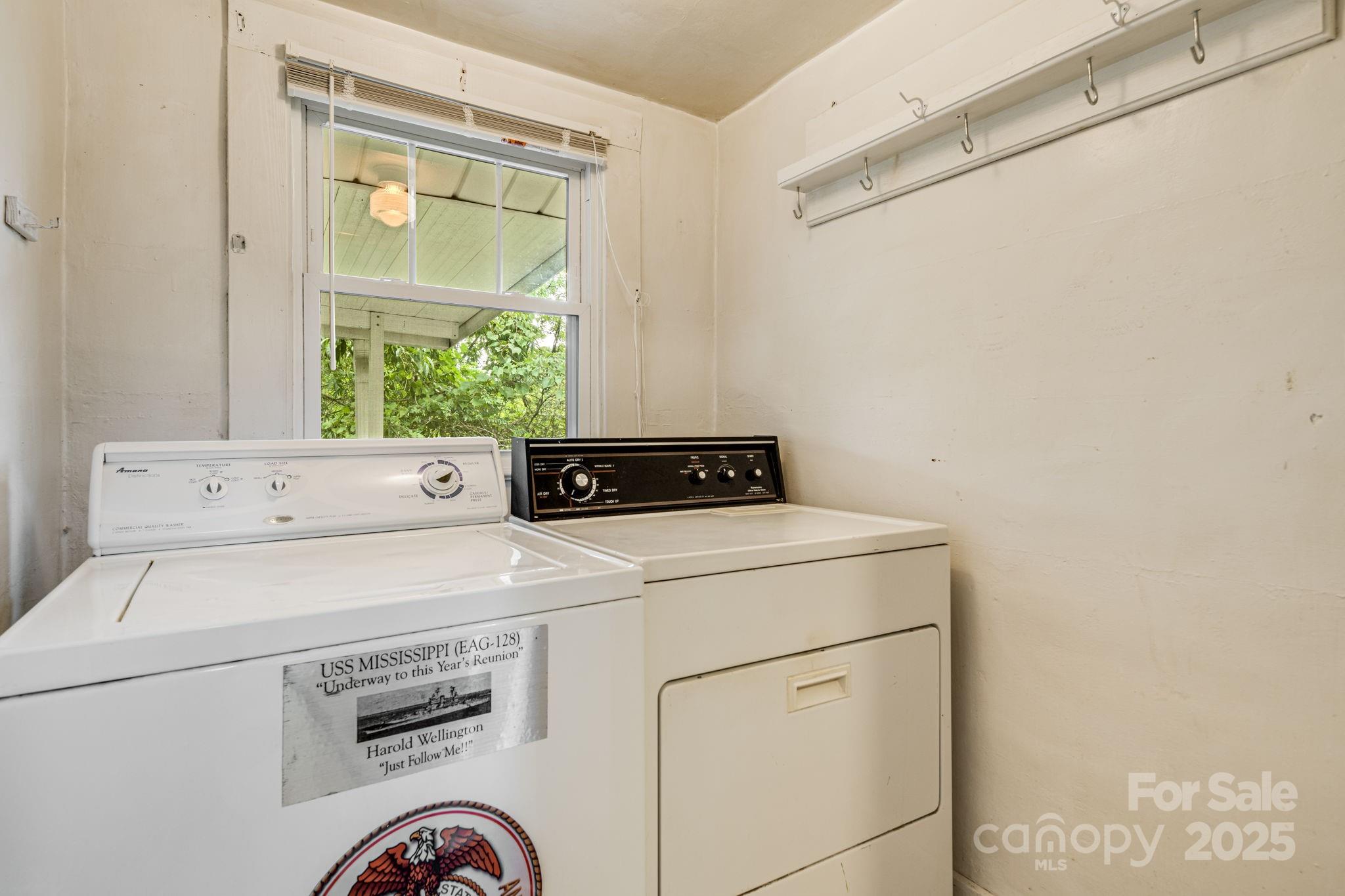 206 Rhododendron Drive Brevard, NC 28712 - Photo 18 of 36 a utility room with dryer and washer