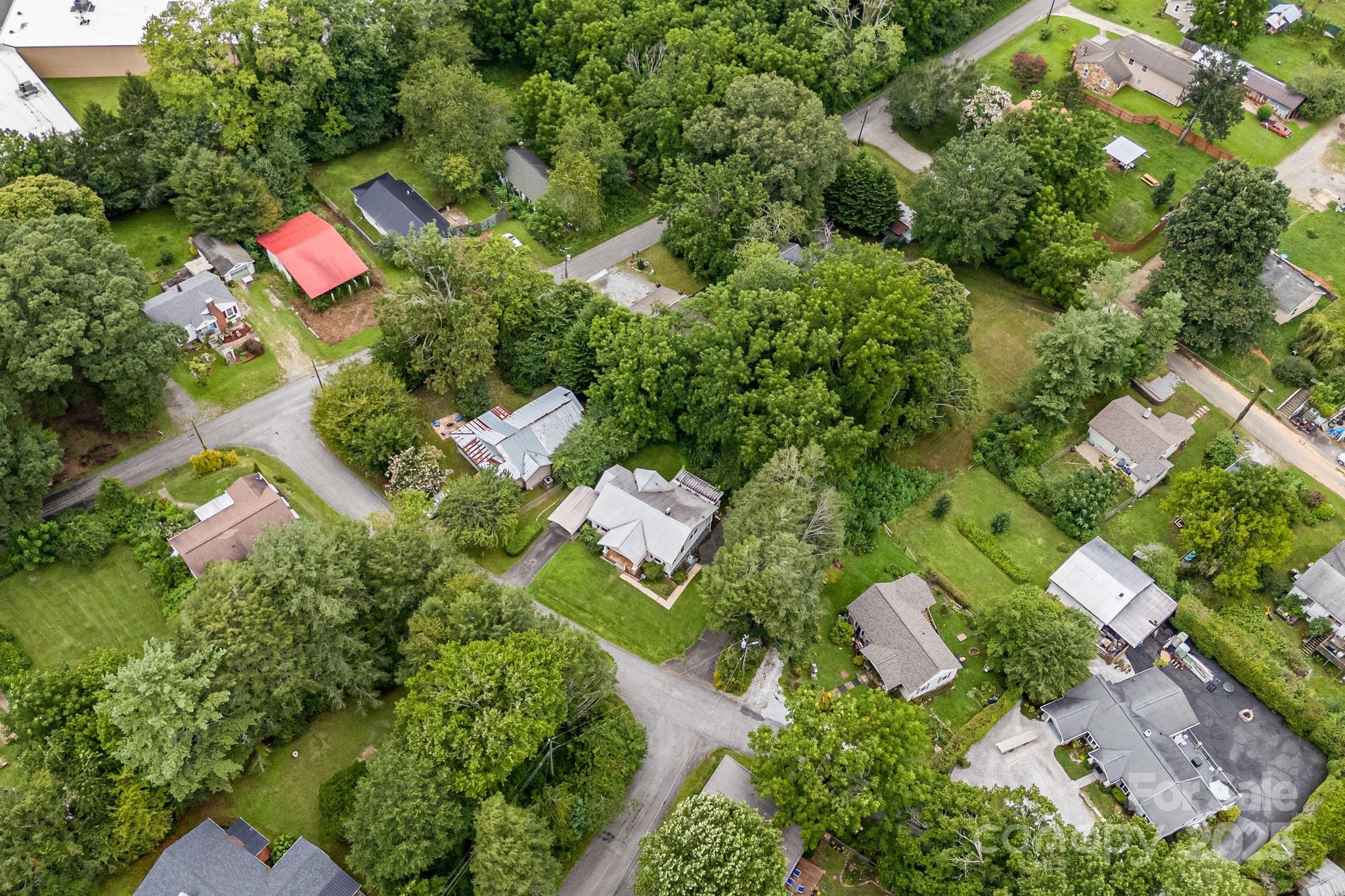 206 Rhododendron Drive Brevard, NC 28712 - Photo 30 of 36 an aerial view of residential house with outdoor space and swimming pool