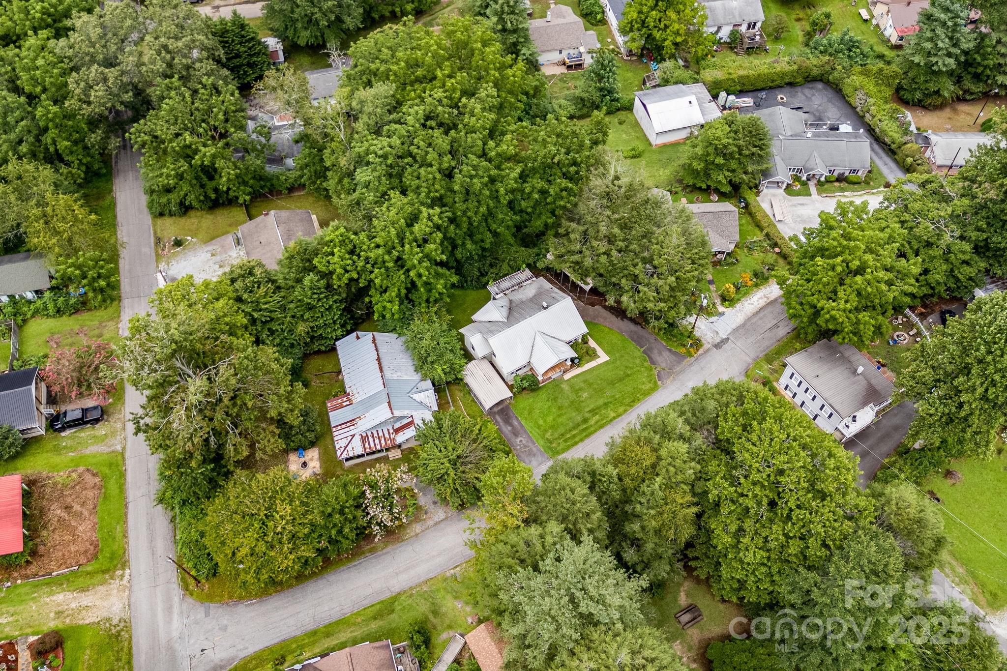 206 Rhododendron Drive Brevard, NC 28712 - Photo 32 of 36 an aerial view of a house with a yard