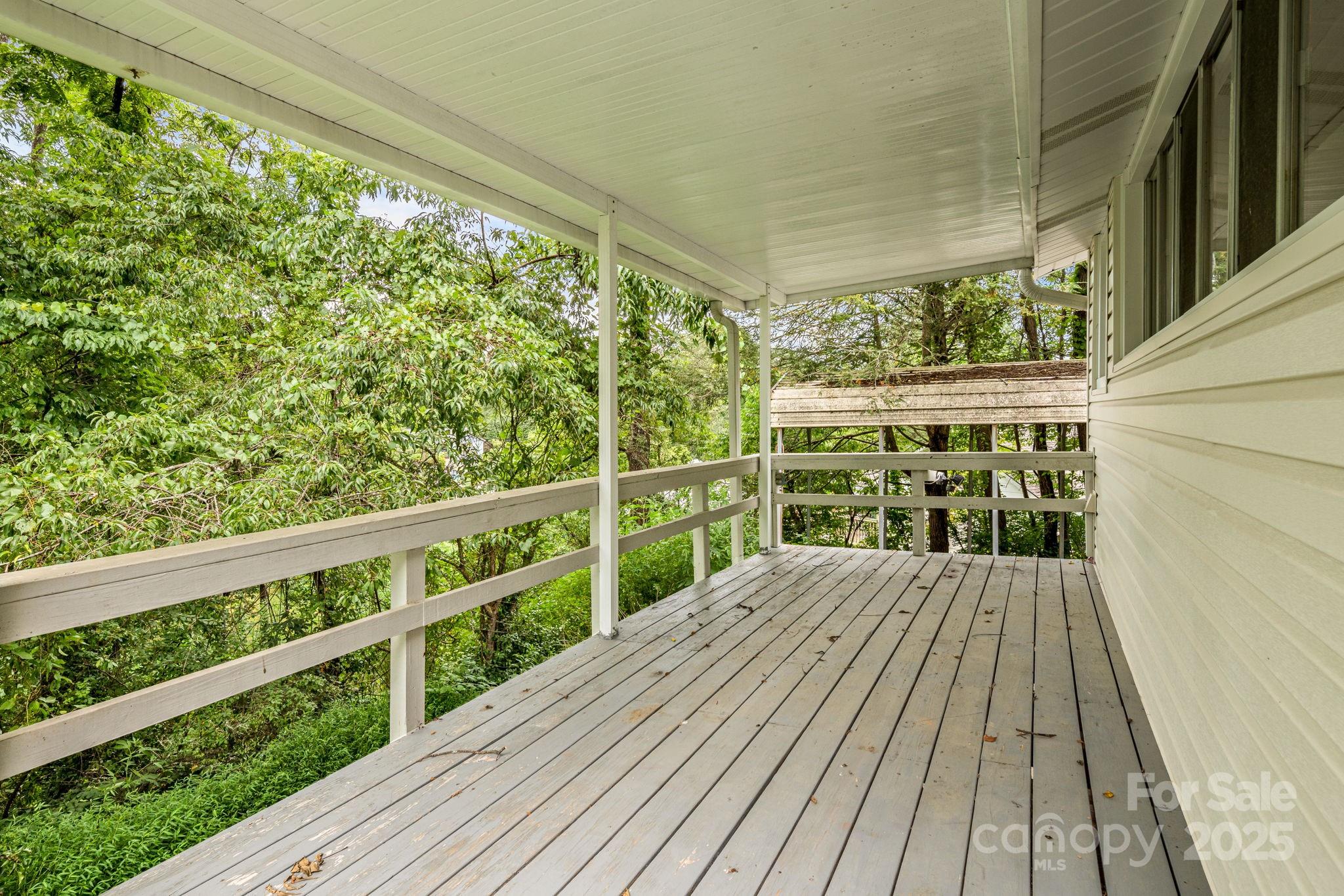 206 Rhododendron Drive Brevard, NC 28712 - Photo 5 of 36 a view of balcony with wooden floor