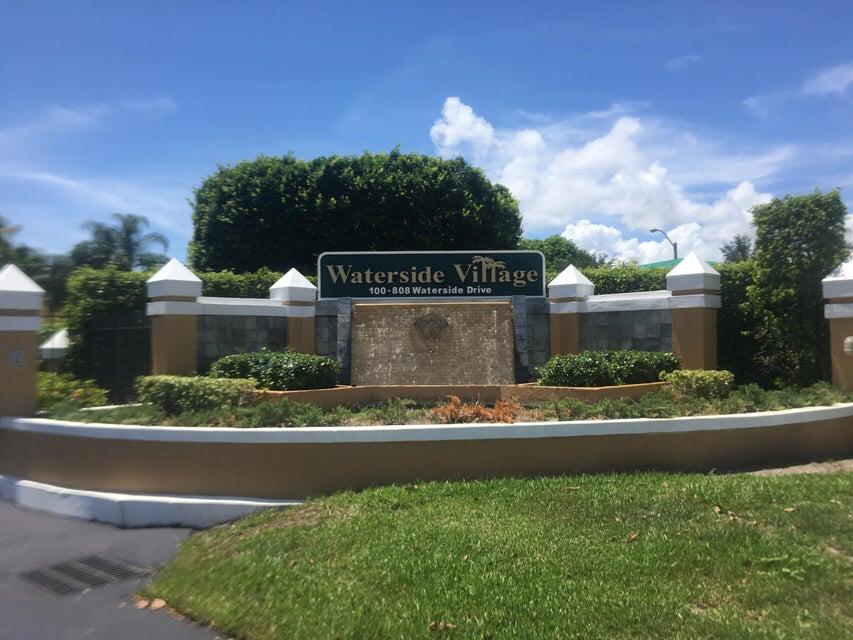 423 Waterside Circle Lake Worth, FL 33462 - Photo 3 of 21 a view of a house with a yard