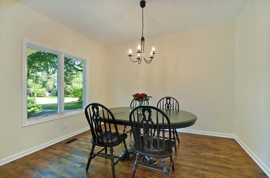 1132 Dell Road Northbrook, IL 60062 - Photo 6 of 20 a view of a dining room with furniture window and outside view