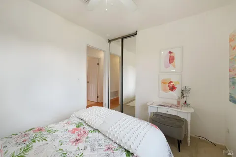 a bedroom with a bed and a dresser