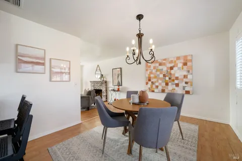 a view of a dining room with furniture
