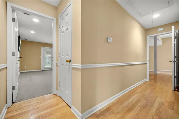 a view of an empty room with a window