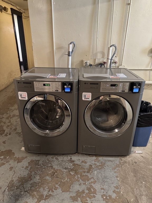 313 Summit Avenue, Unit 5 Boston, MA 02135 - Photo 13 of 13 a utility room with dryer and washer