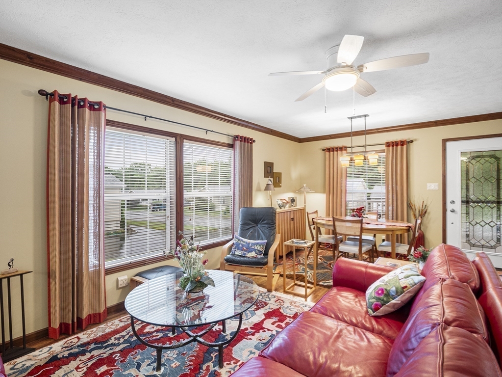 53 Ruby Road Gardner, MA 01440 - Photo 16 of 40 a living room with furniture and a floor to ceiling window