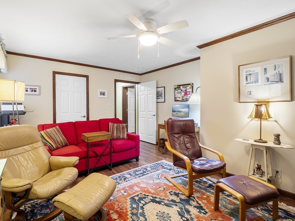 53 Ruby Road Gardner, MA 01440 - Photo 19 of 40 a living room with furniture a rug and a lamp
