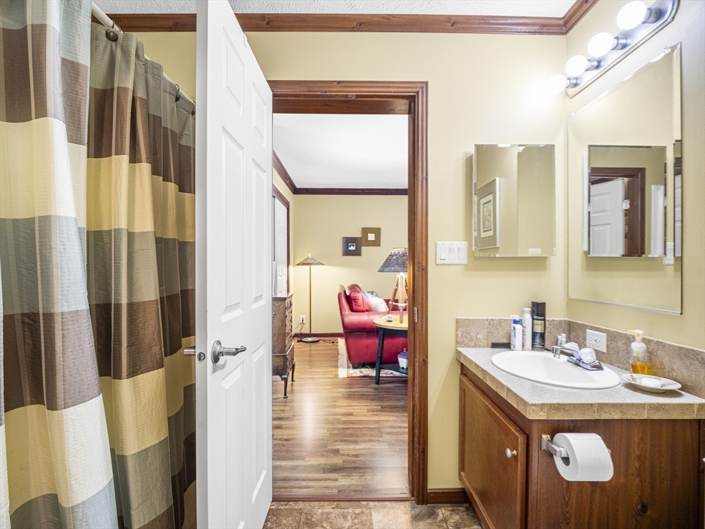53 Ruby Road Gardner, MA 01440 - Photo 21 of 40 a bathroom with a sink mirror and a bath tub