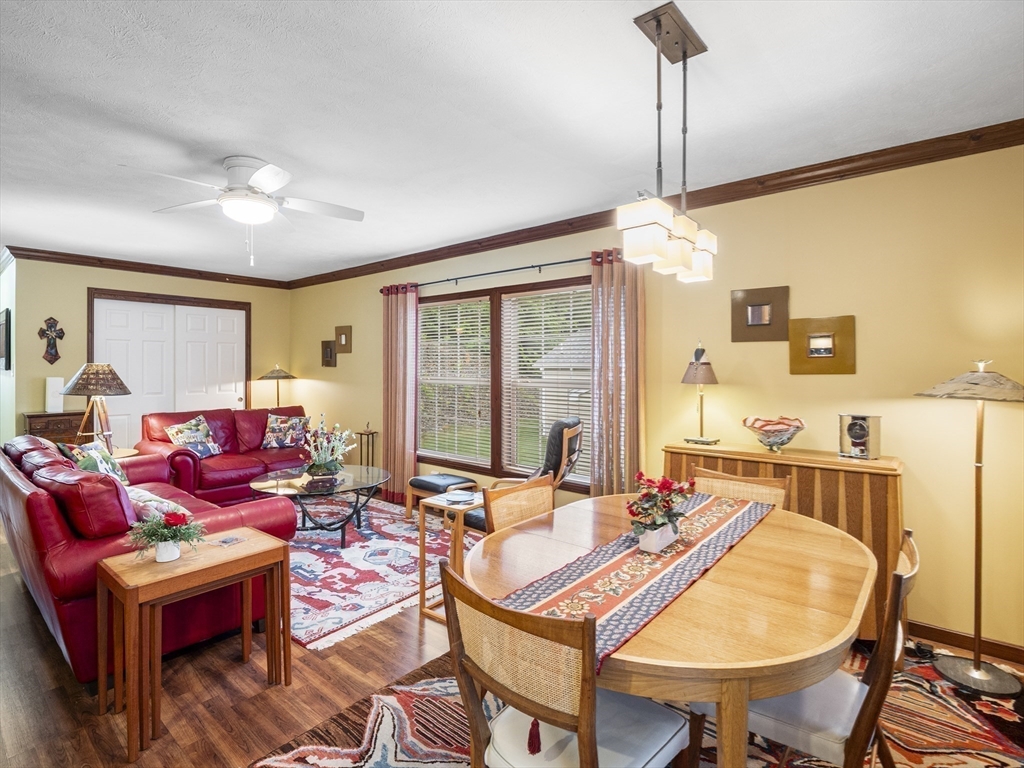 53 Ruby Road Gardner, MA 01440 - Photo 23 of 40 a living room with furniture a flat screen tv and a large window