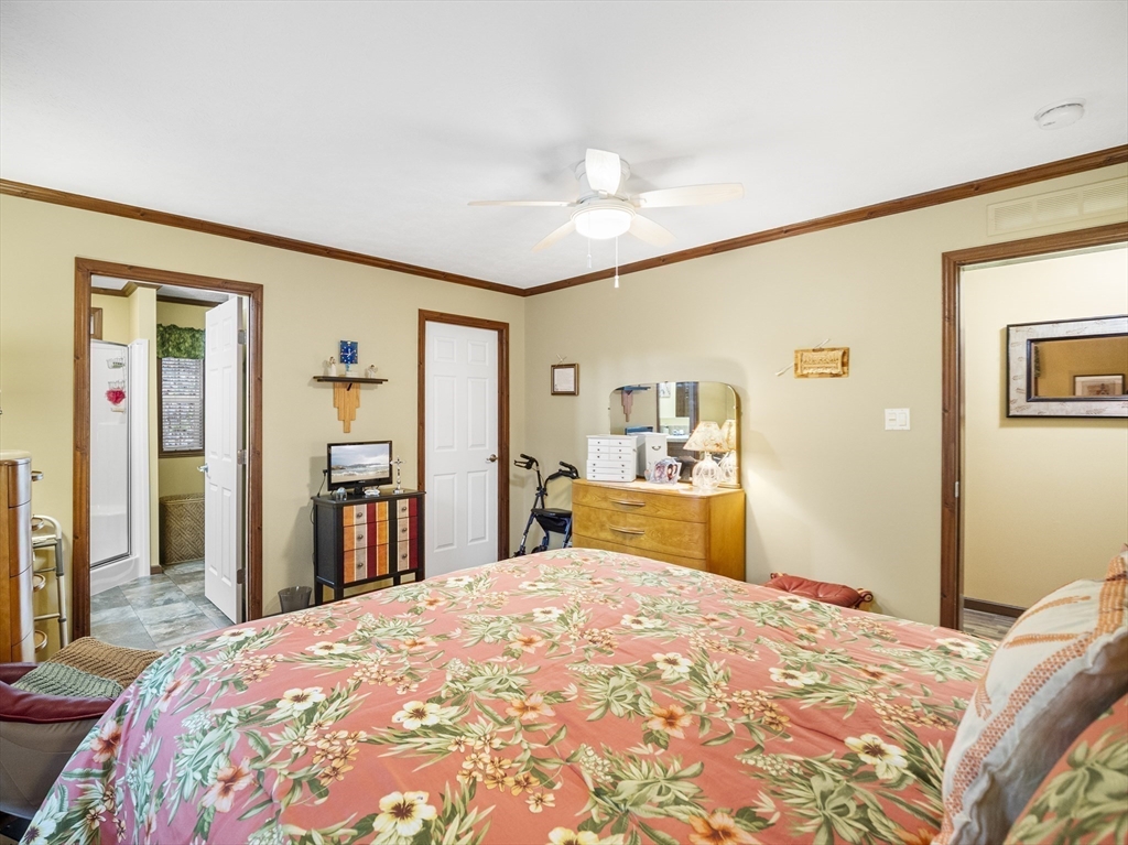 53 Ruby Road Gardner, MA 01440 - Photo 27 of 40 a bedroom with bed dresser and a large mirror