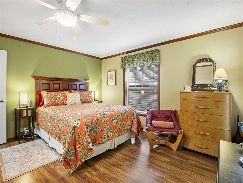 53 Ruby Road Gardner, MA 01440 - Photo 29 of 40 a bedroom with a bed and wooden floor