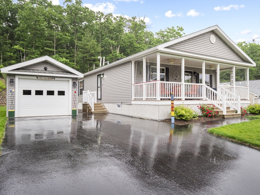 53 Ruby Road Gardner, MA 01440 - Photo 3 of 40 a front view of a house with garden