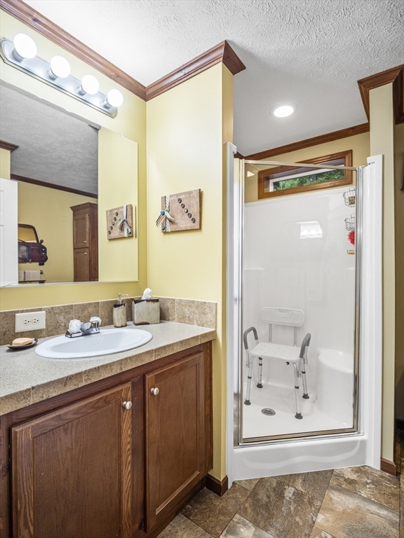 53 Ruby Road Gardner, MA 01440 - Photo 32 of 40 a bathroom with a granite countertop sink a mirror a shower and a mirror