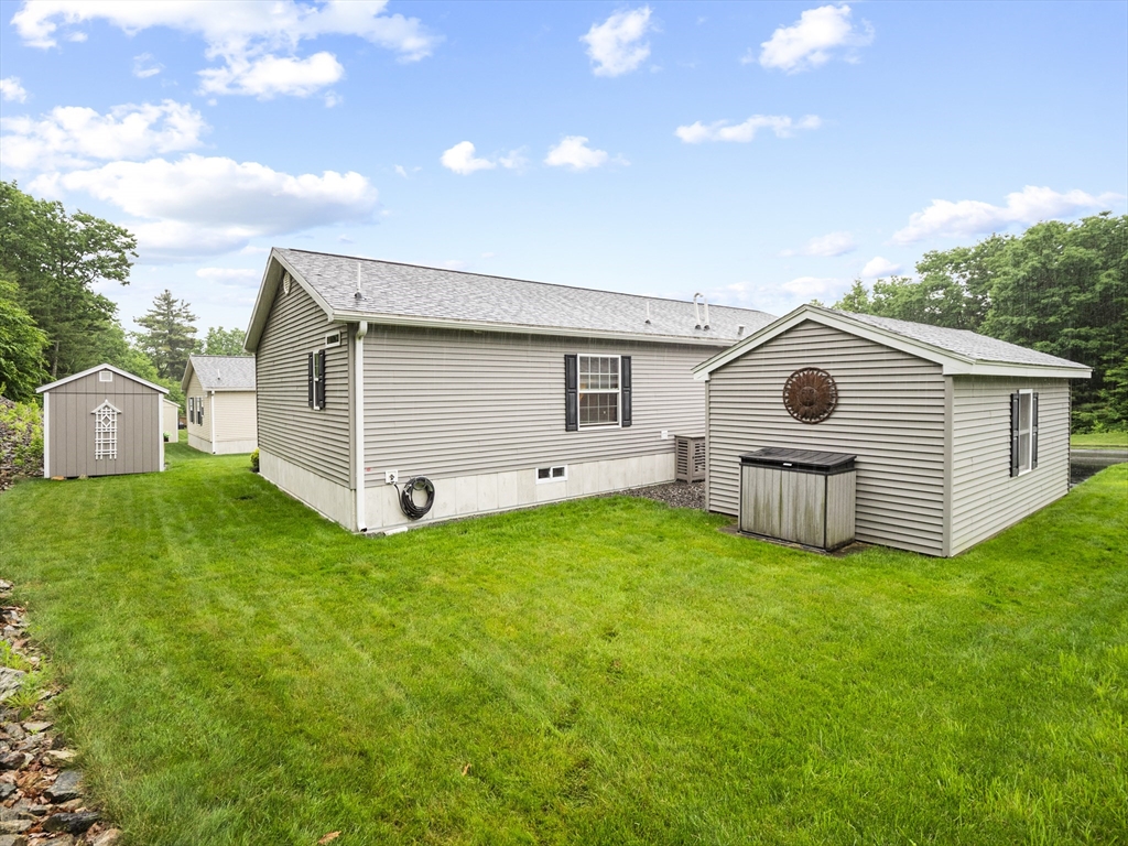 53 Ruby Road Gardner, MA 01440 - Photo 39 of 40 a view of a backyard with a garden