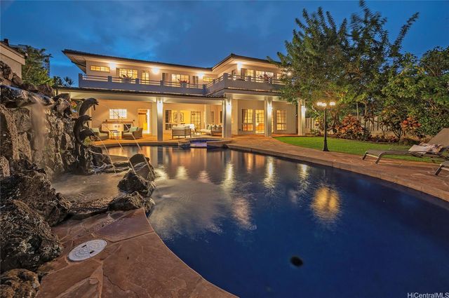 a view of a swimming pool with an outdoor space