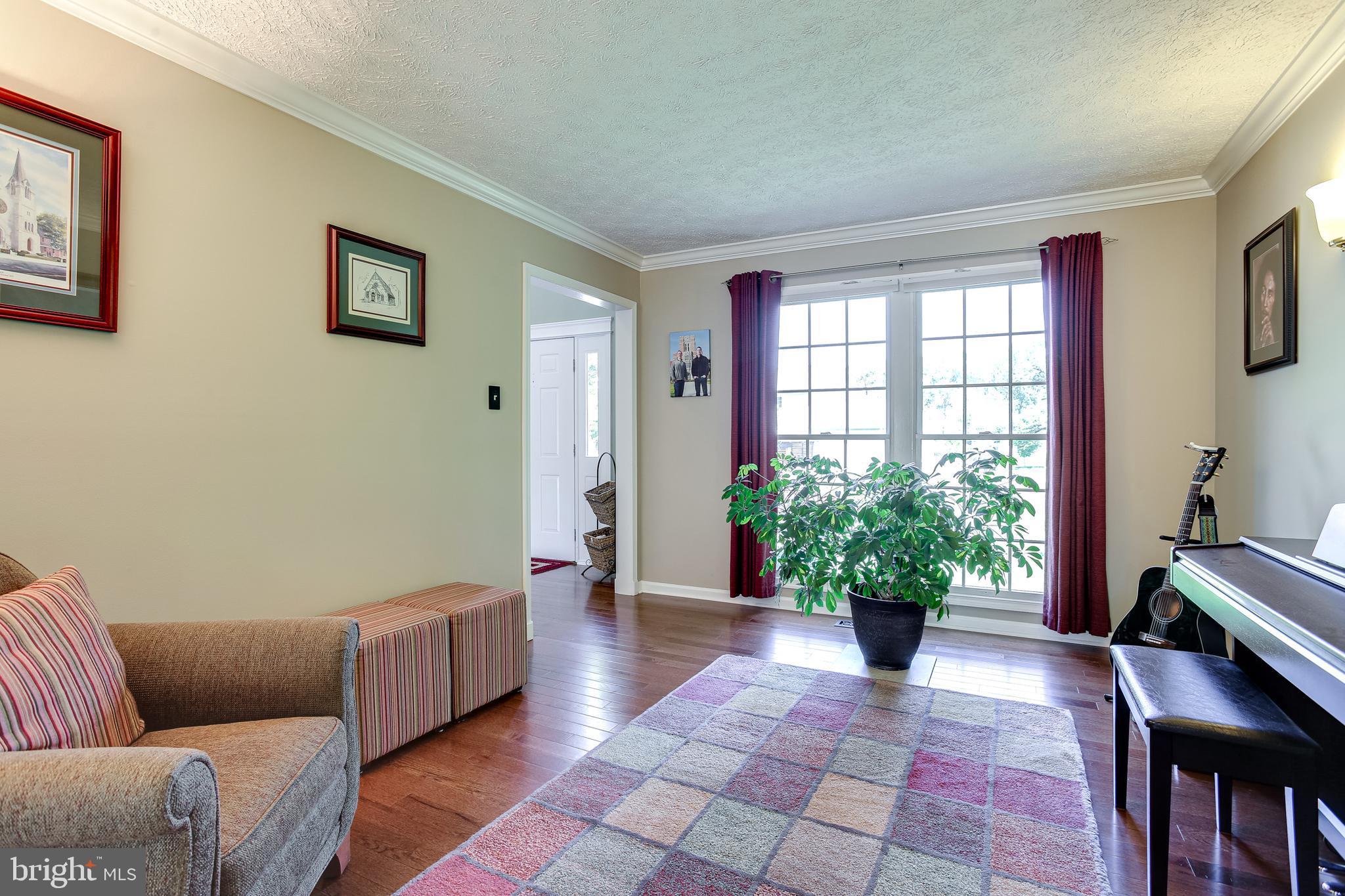 8247 Spring Branch Court Laurel, MD 20723 - Photo 6 of 36 Living Room Connects To Dining Room