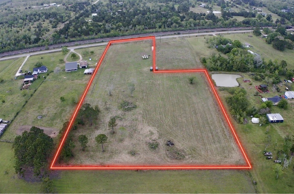 9715 County Road 171 Liverpool, TX 77577 - Photo 2 of 9 a view of swimming pool with a yard