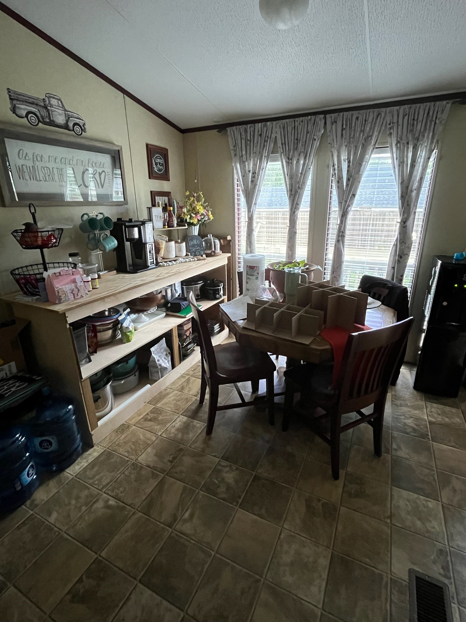 4715 3rd Street Bacliff, TX 77518 - Photo 7 of 18 The dining area has natural light and is large enough for a 4-6 person dining table.