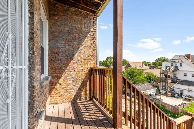 a view of balcony with furniture