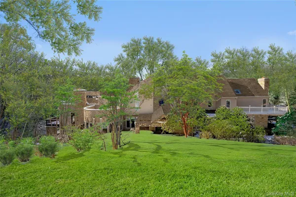 an aerial view of residential house with outdoor space