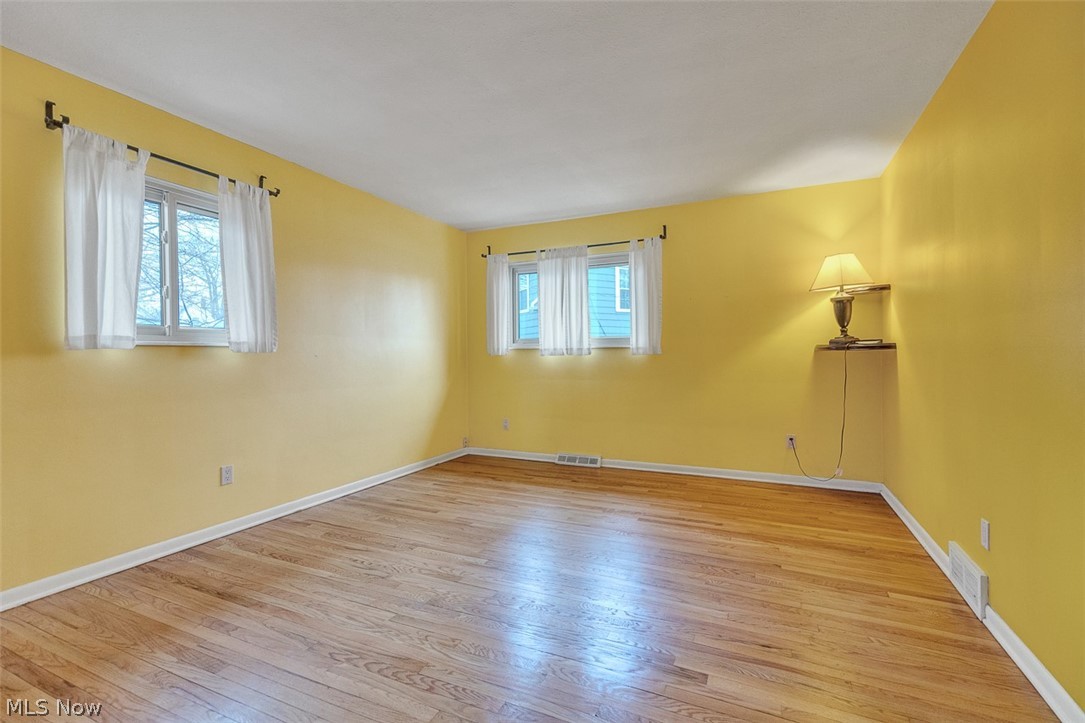 2990 Hampton Road Cleveland, OH 44120 - Photo 26 of 29 Bedroom with light wood-type flooring and baseboards
