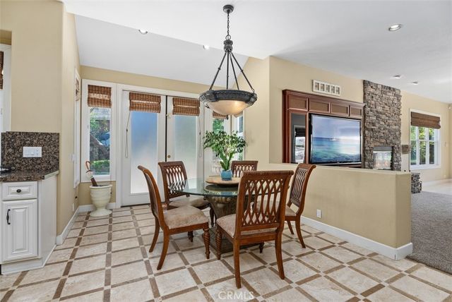a kitchen with a sink stove and refrigerator