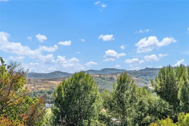 a view of a city with a mountain in the background