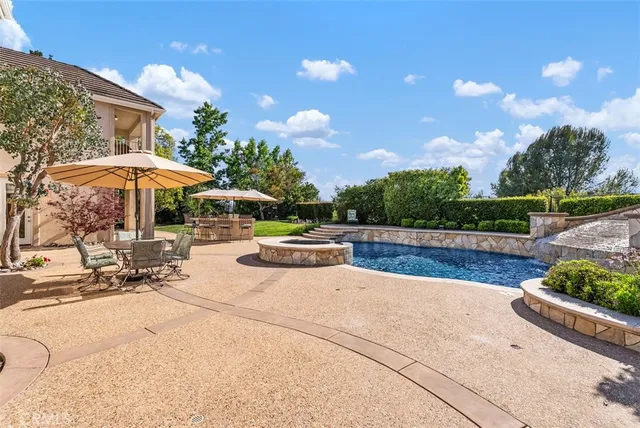 a view of a park with large trees